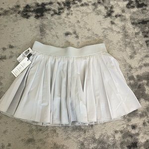 Pleated TNA mini skirt with built in shorts NEW
